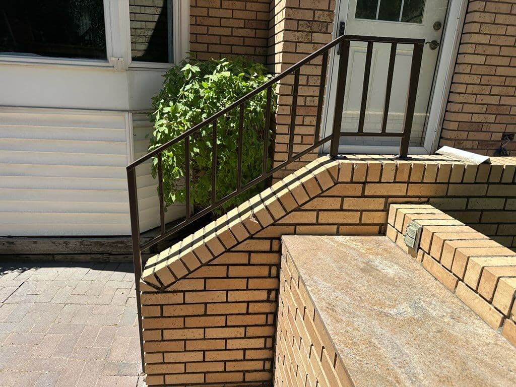 Gallery photos for Brick Patio Upgrade with Elegant Metal Railing: Image #1