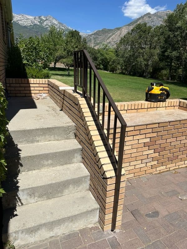 Gallery photos for Brick Patio Upgrade with Elegant Metal Railing: Image #2